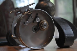 Click and pawl reel